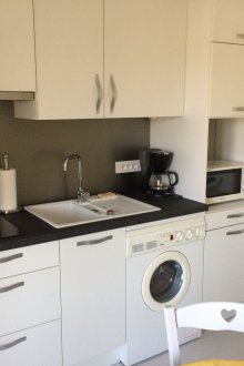 Пералня в кухненския шкаф