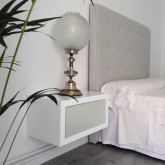 Wall-mounted gray-white bedside table
