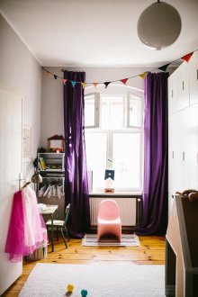 Children's layout with purple curtains