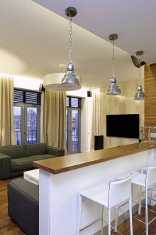 Дизайн кухня за хол с бар за закуска