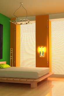 Комбинацията от оранжев и зелен тапет в спалнята