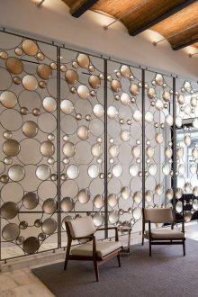 Ideen für die Zonierung einer dekorativen Trennwand