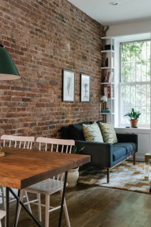 Gaya pangsapuri satu bilik dengan dinding bata