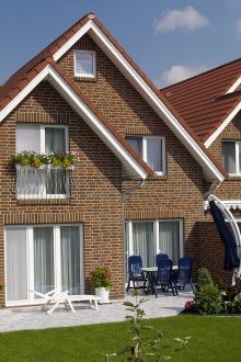 Малки къщи с тухлена облицовка