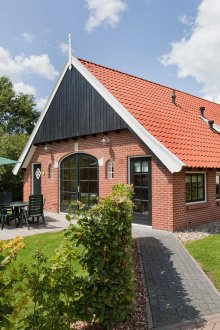 Изложение на къщата за гости с червена тухла