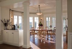 White columns to separate the dining room from other areas