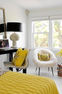 Dressing table from a regular table and a large mirror in the bedroom