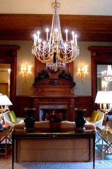 Beautiful and plentiful lighting in the Empire style living room